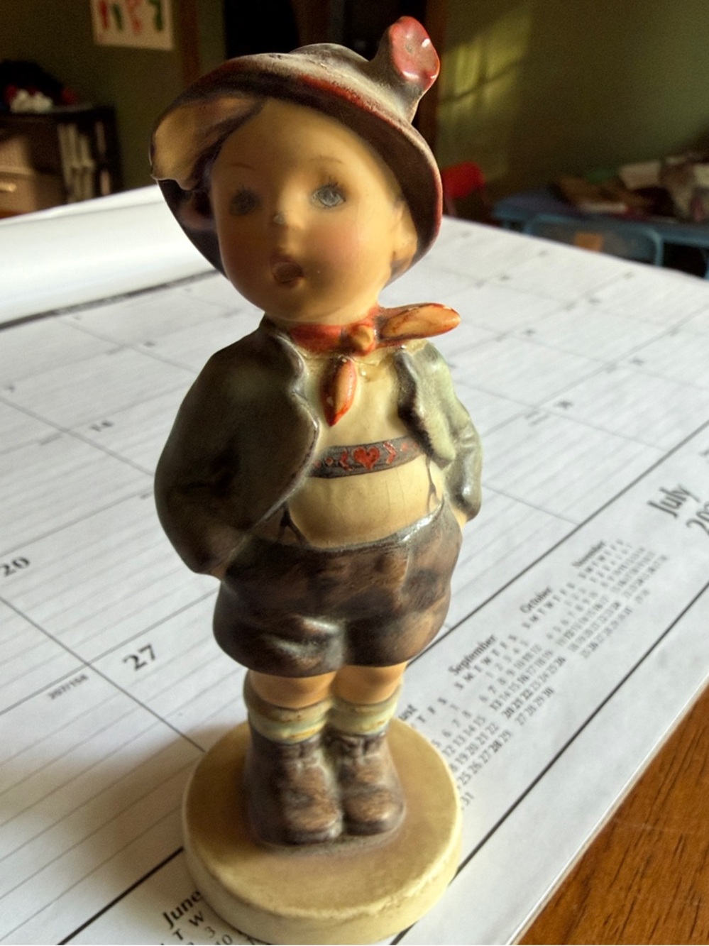 Hand-Painted Ceramic Boy Figurine in Beige and Brown  HUMMEL